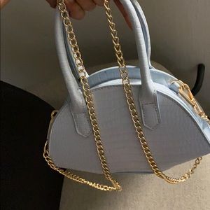 Powder baby blue handbag